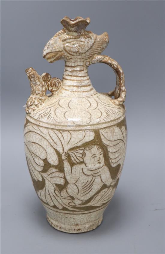 A Chinese Cizhou style phoenix head ewer, height 33.5cm